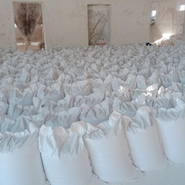 Hydrated Lime 25 kg HDPE bags — stacked in warehouse
